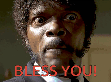 A Close Up Of A Man 'S Face With The Words Bless You In Red Letters GIF