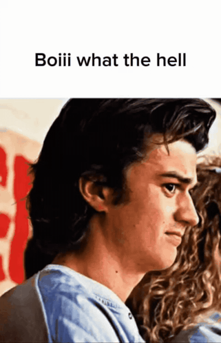 A Close Up Of A Man 'S Face With The Words Boiii What The Hell Above Him GIF