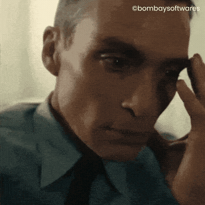 A Close Up Of A Man 'S Face With The Words Bombaysoftwares Visible GIF