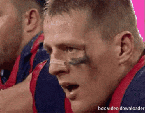A Close Up Of A Man 'S Face With The Words Box Video Downloader Below GIF