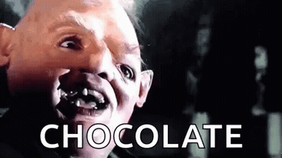 A Close Up Of A Man 'S Face With The Words `` Chocolate '' Written On The Bottom . GIF
