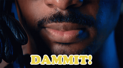 A Close Up Of A Man 'S Face With The Words Dammit Written In Yellow GIF
