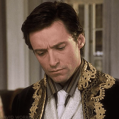 A Close Up Of A Man 'S Face With The Words David Worrell On The Bottom Right GIF