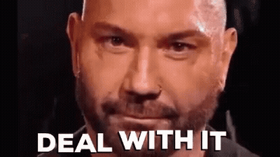 A Close Up Of A Man 'S Face With The Words Deal With It Written Below It . GIF