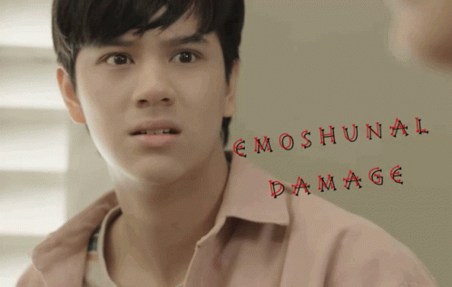 A Close Up Of A Man 'S Face With The Words Emoshunal Damage Written Below Him GIF