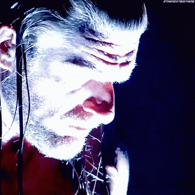 A Close Up Of A Man 'S Face With The Words " Ethenextbigthing " On The Bottom Right GIF