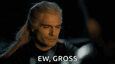 A Close Up Of A Man 'S Face With The Words Ew Gross Behind Him GIF