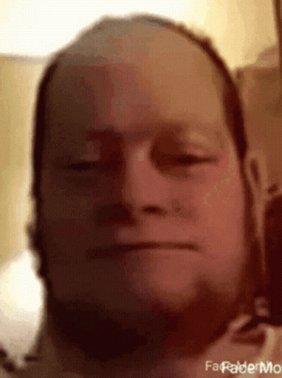 A Close Up Of A Man 'S Face With The Words " Fafadermo " On The Bottom Right GIF