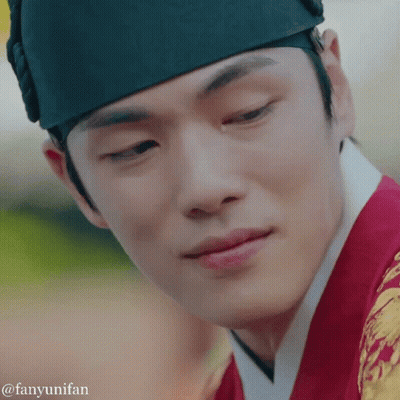 A Close Up Of A Man 'S Face With The Words Fanyunifan Written Below It GIF