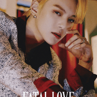 A Close Up Of A Man 'S Face With The Words " Fatal Love " On The Bottom GIF