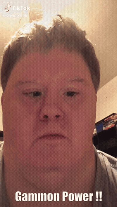 a close up of a man 's face with the words gammon power written below it