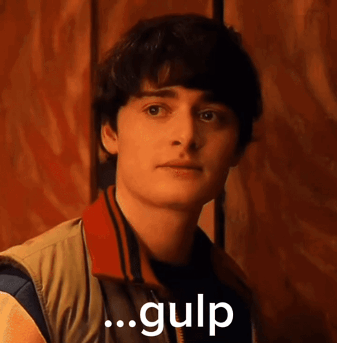 A Close Up Of A Man 'S Face With The Words Gulp Written On The Bottom GIF
