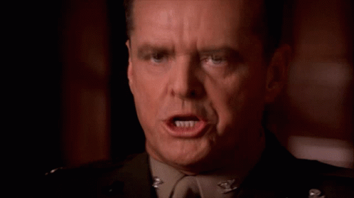 A Close Up Of A Man 'S Face With The Words Handle The On The Bottom GIF