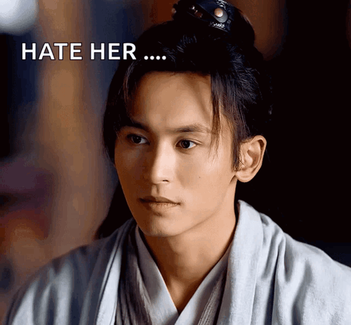 A Close Up Of A Man 'S Face With The Words Hate Her Above It GIF