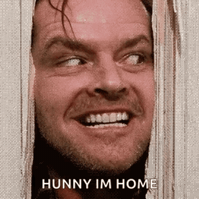A Close Up Of A Man 'S Face With The Words Hunny Im Home Written Below It . GIF