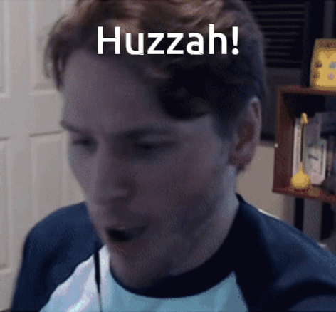 A Close Up Of A Man 'S Face With The Words Huzzah Written On It GIF