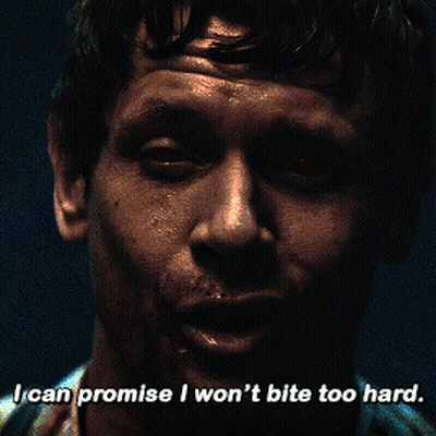 A Close Up Of A Man 'S Face With The Words " I Can Promise I Won 'T Bite Too Hard " GIF