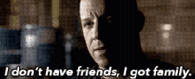 A Close Up Of A Man 'S Face With The Words `` I Do N't Have Friends , I Got Family . '' GIF