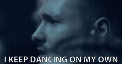 A Close Up Of A Man 'S Face With The Words I Keep Dancing On My Own Below Him GIF