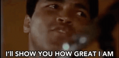 A Close Up Of A Man 'S Face With The Words `` I 'Ll Show You How Great I Am '' GIF