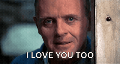 A Close Up Of A Man 'S Face With The Words I Love You Too Below Him GIF