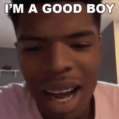 A Close Up Of A Man 'S Face With The Words `` I 'M A Good Boy '' Written Above Him . GIF