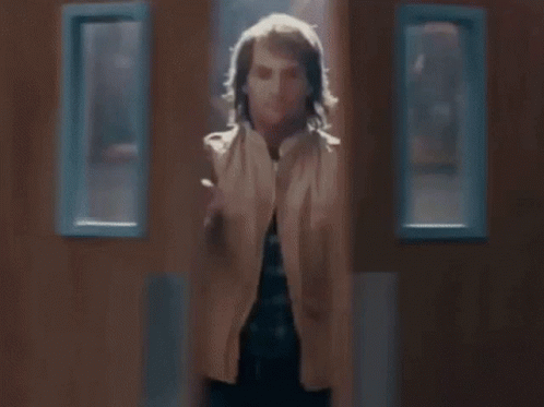 A Close Up Of A Man 'S Face With The Words " I 'M " Above Him GIF