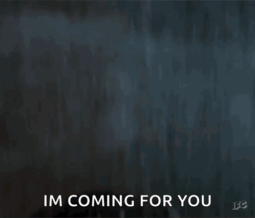 A Close Up Of A Man 'S Face With The Words I 'M Coming For You Written Below Him GIF