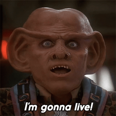 A Close Up Of A Man 'S Face With The Words I 'M Gonna Live GIF