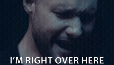 A Close Up Of A Man 'S Face With The Words " I 'M Right Over Here " Below Him GIF