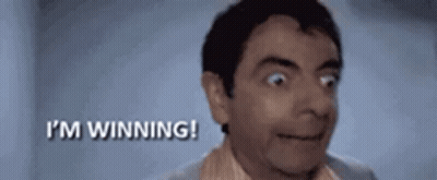A Close Up Of A Man 'S Face With The Words `` I 'M Winning '' Behind Him . GIF