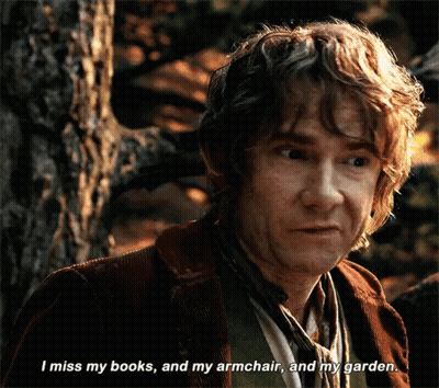 A Close Up Of A Man 'S Face With The Words " I Miss My Books And My Armchair And My Garden " GIF
