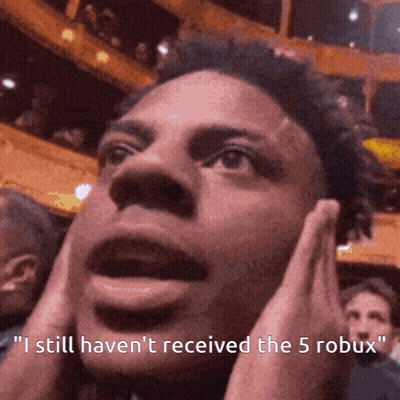 A Close Up Of A Man 'S Face With The Words " I Still Haven 'T Received The 5 Robux " Below Him GIF