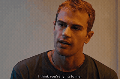 A Close Up Of A Man 'S Face With The Words I Think You 'Re Lying To Me GIF