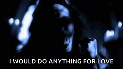 A Close Up Of A Man 'S Face With The Words `` I Would Do Anything For Love '' GIF