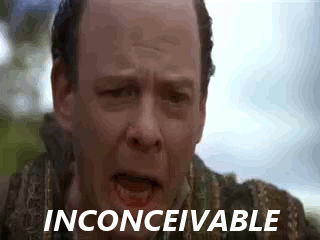 A Close Up Of A Man 'S Face With The Words `` Inconceivable '' Written Above Him . GIF
