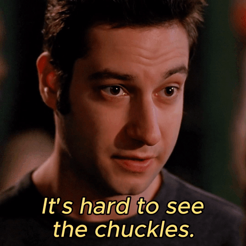 A Close Up Of A Man 'S Face With The Words It 'S Hard To See The Chuckles Below Him GIF