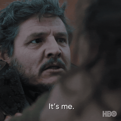 A Close Up Of A Man 'S Face With The Words It 'S Me Behind Him GIF