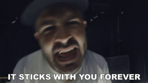A Close Up Of A Man 'S Face With The Words It Sticks With You Forever Below It GIF