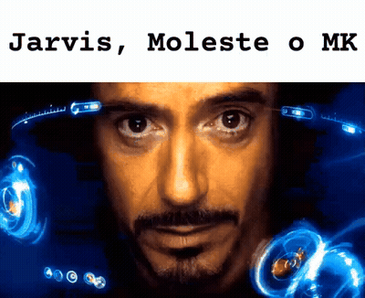 A Close Up Of A Man 'S Face With The Words Jarvis , Moleste O Mike Below It GIF