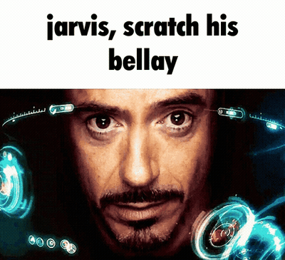 A Close Up Of A Man 'S Face With The Words Jarvis Scratch His Bellay GIF