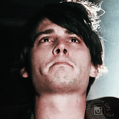 A Close Up Of A Man 'S Face With The Words Johnnydepp Gifs On The Bottom Right GIF
