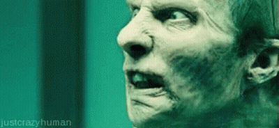 A Close Up Of A Man 'S Face With The Words Just Crazy Human In The Corner GIF