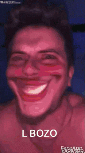 A Close Up Of A Man 'S Face With The Words L Bozo Written On The Bottom . GIF