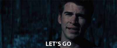 A Close Up Of A Man 'S Face With The Words Let 'S Go Below Him GIF