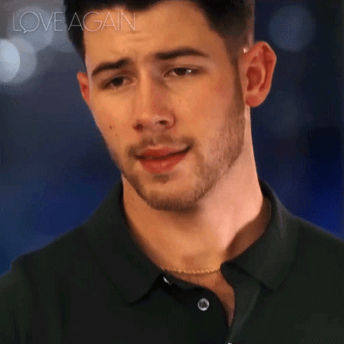 A Close Up Of A Man 'S Face With The Words Love Again Written Above Him GIF