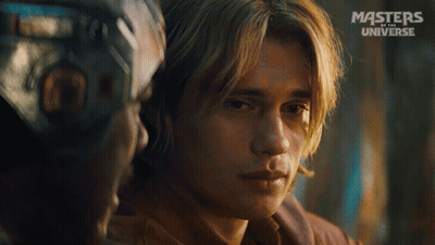 A Close Up Of A Man 'S Face With The Words Masters Of The Universe On The Bottom Right GIF