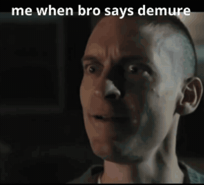 A Close Up Of A Man 'S Face With The Words " Me When Bro Says Demure " Above Him GIF