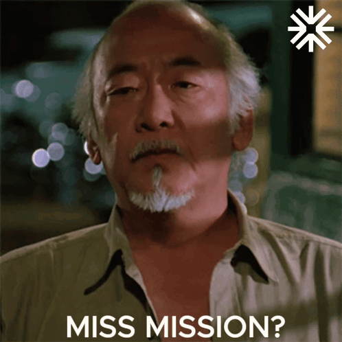 A Close Up Of A Man 'S Face With The Words Miss Mission Behind Him GIF