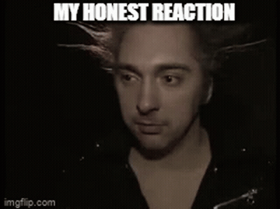 A Close Up Of A Man 'S Face With The Words My Honest Reaction GIF